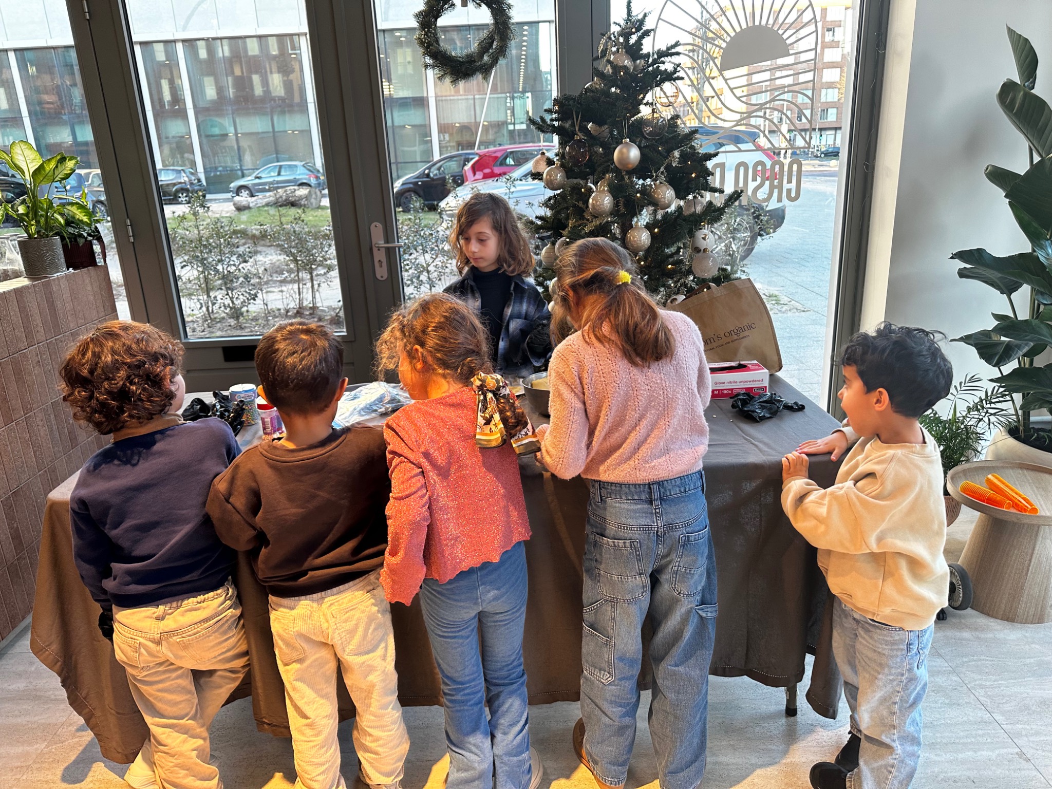 Children taking part in a creative activity at Casa Dawn